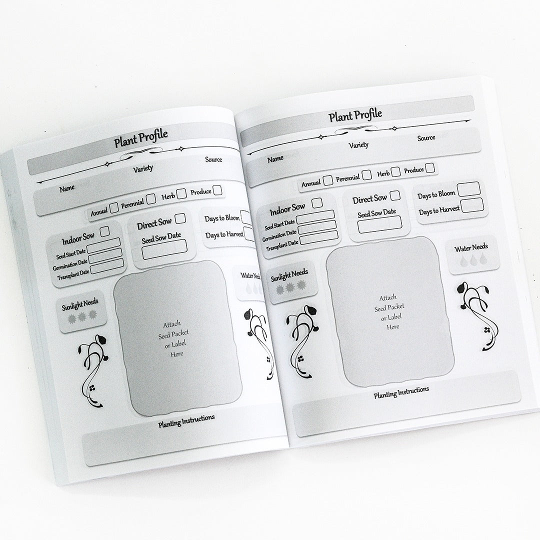 A view of some inside pages of the Garden Planner, Journal, and Log Book on white.
