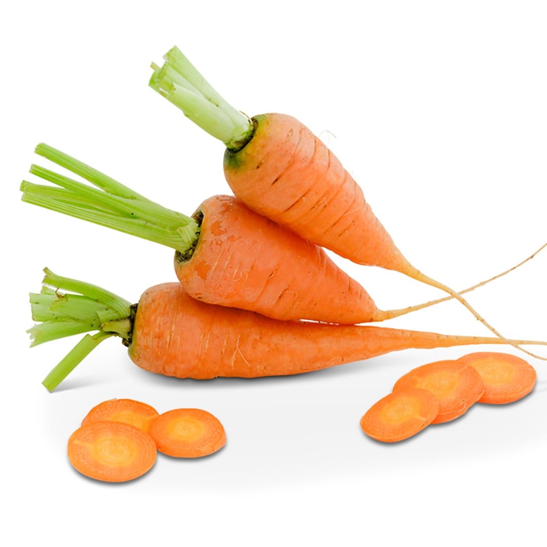 Three Chantenay Red Core Carrots stacked on top of one another with sliced carrots surround on a white background.