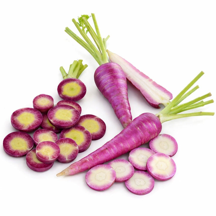 Gniff carrots with slices on a white background.