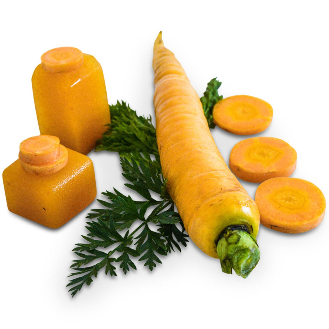 Whole and sliced Jaune Obtuse Du Doubs Carrots on a white background.
