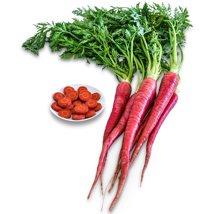 Kyoto Red Carrots with chopped carrots on a plate on a white background.
