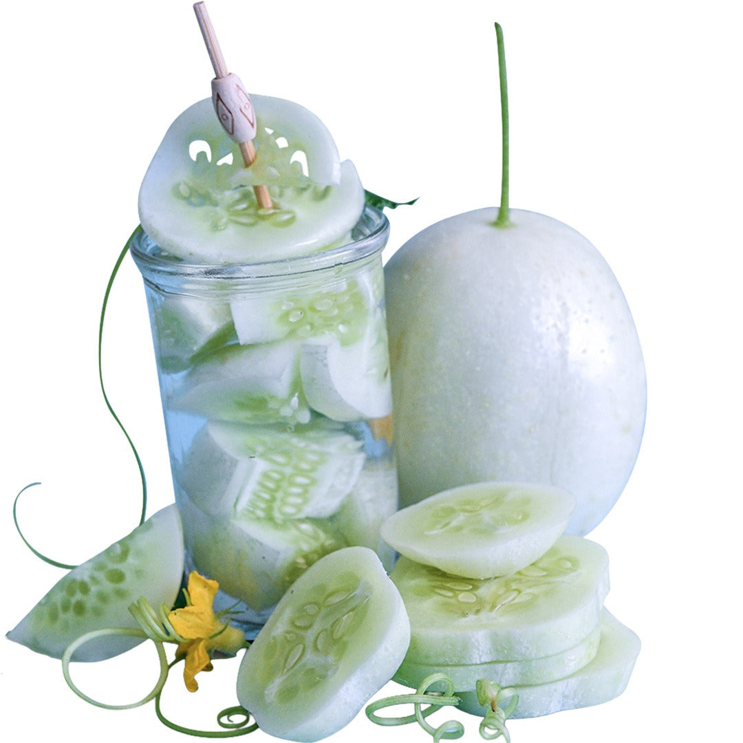 Crystal Apple Cucumbers with cucumber water on a white background.