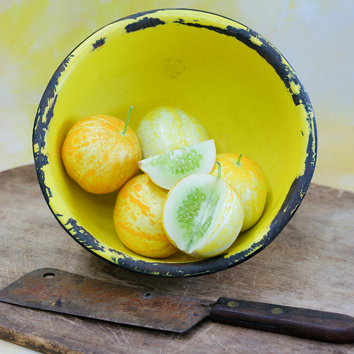 Lemon Cukes in yellow bowl.