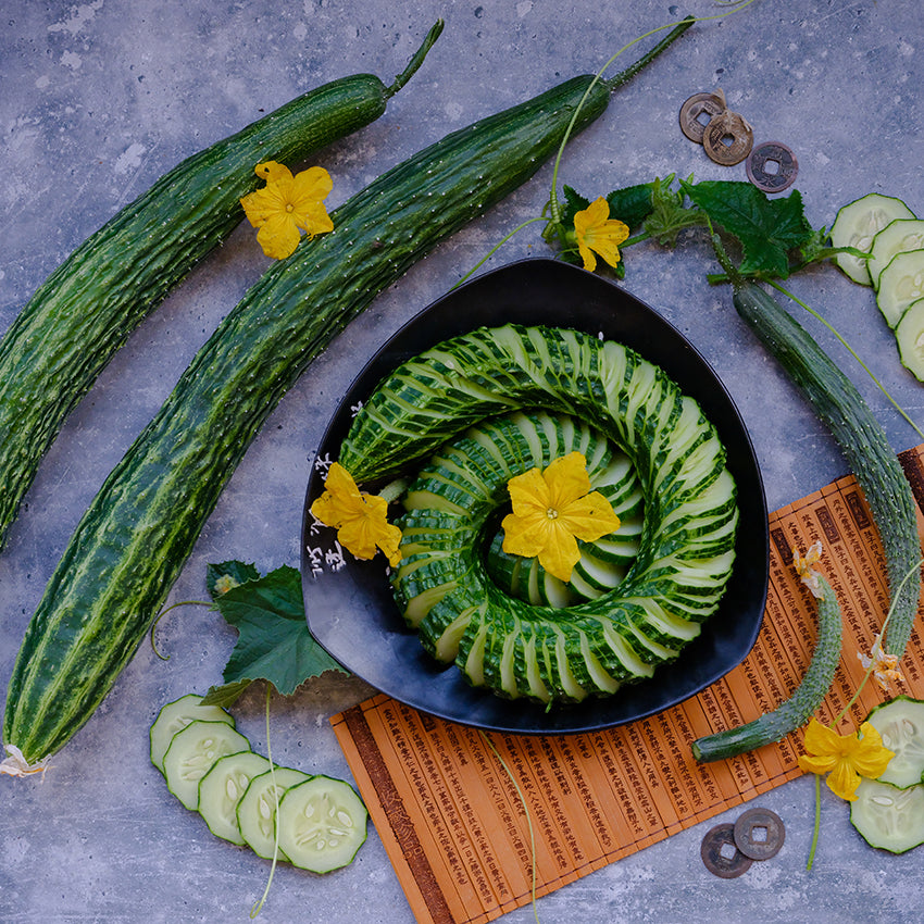 Suyo Long Cucumber in spiral arrangement from above.
