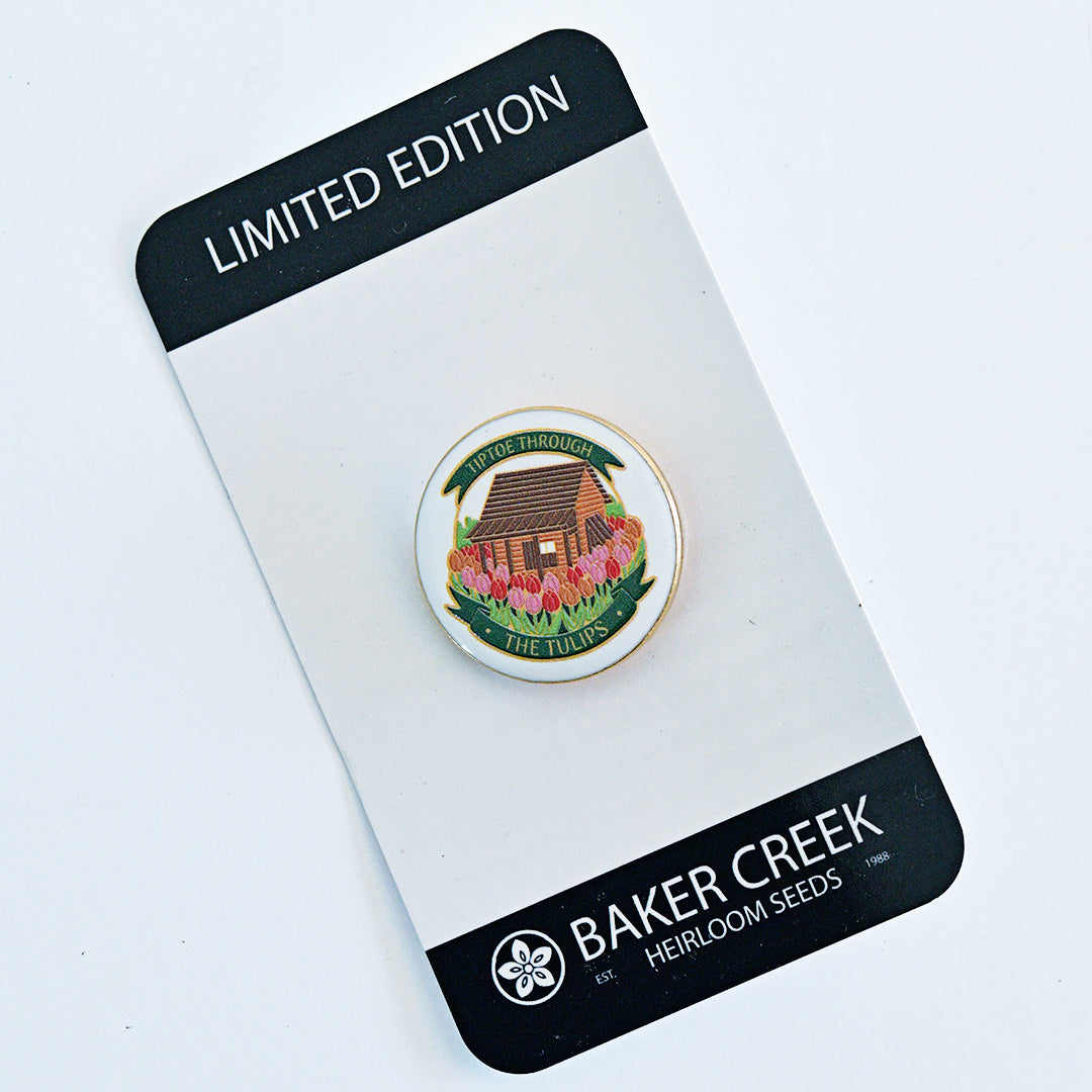 A Baker Creek Limited Edition Tulip Cabin Pin with packaging on white background.