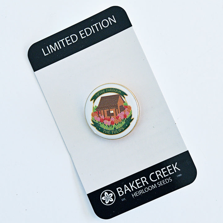 A Baker Creek Limited Edition Tulip Cabin Pin with packaging on white background.