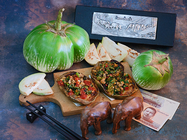 Cambodian Green Giant Eggplant with roasted eggplant on a mixed background.