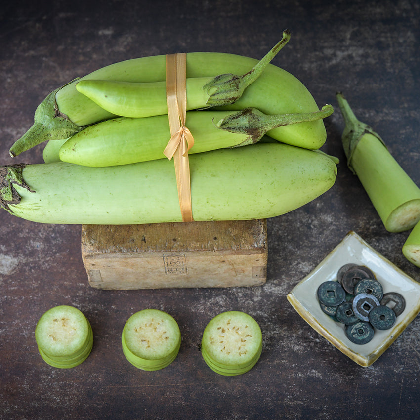 Satsuma White Eggplant bundle with slices.