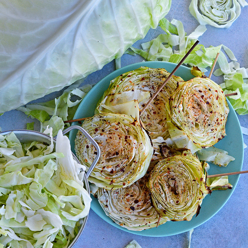Roasted and seasoned cabbage steaks made from Filderkraut Cabbage slices.
