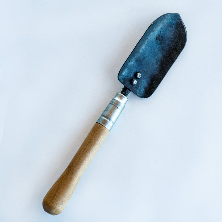Frontside view of the hand-forged Long Handled Trowel against a white background.