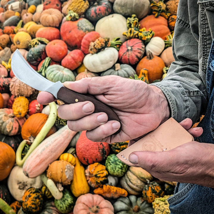 Cody Hughes shows how his handmade knife fits perfectly in his hand.