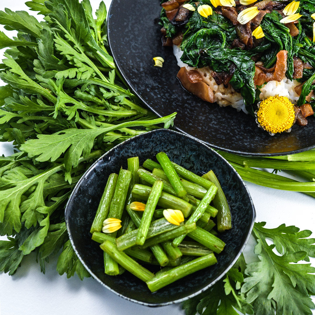 Close-up view of cooked greens and stems from the Otafuku Chrysanthemum.