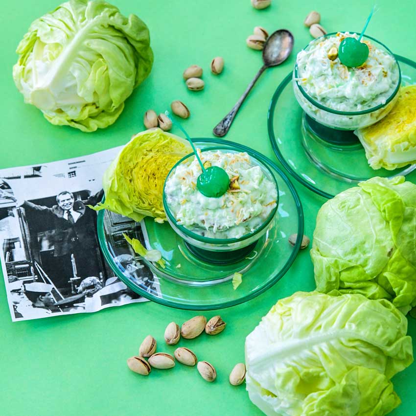Tennis Ball Lettuce head in bowl and as chopped Watergate salad on a green background.
