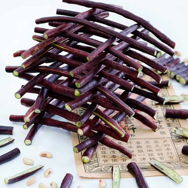 Chinese Red Noodle Long Beans are cut and stacked like Lincoln Logs.