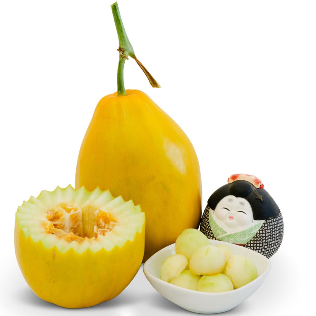 Golden Crispy Melon with melon balls on a white background.