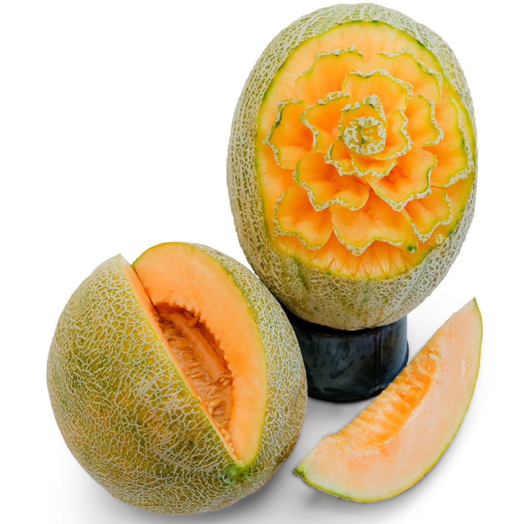 Hale's Best 45 Melons with intricate floral carving on a white background.
