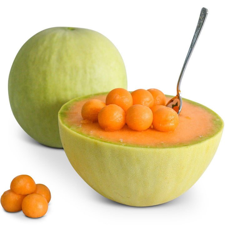 Whole and cut Honeydew Orange Flesh Melon with melon balls on a white background.