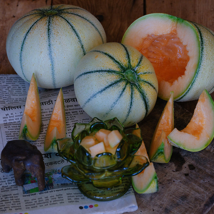 Madhu Ras Melons, whole wedged and cubed.