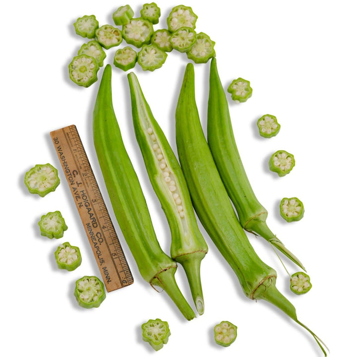 Cut and whole Clemson Spineless Okra on a white background.