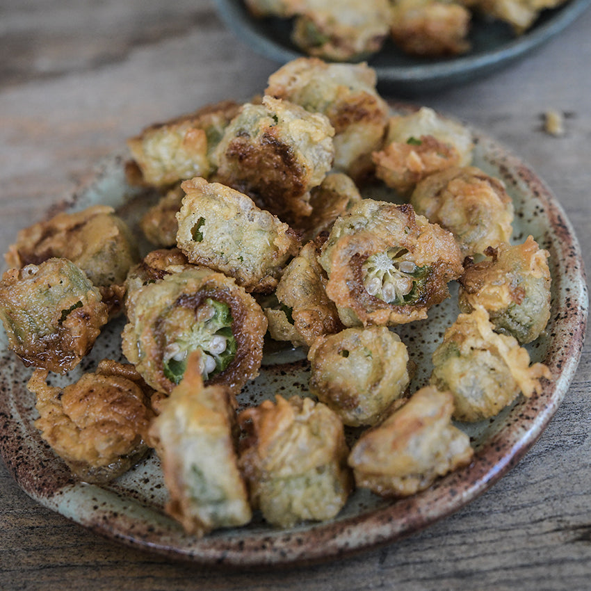 Tempura fried Clemson Spineless Okra slices.