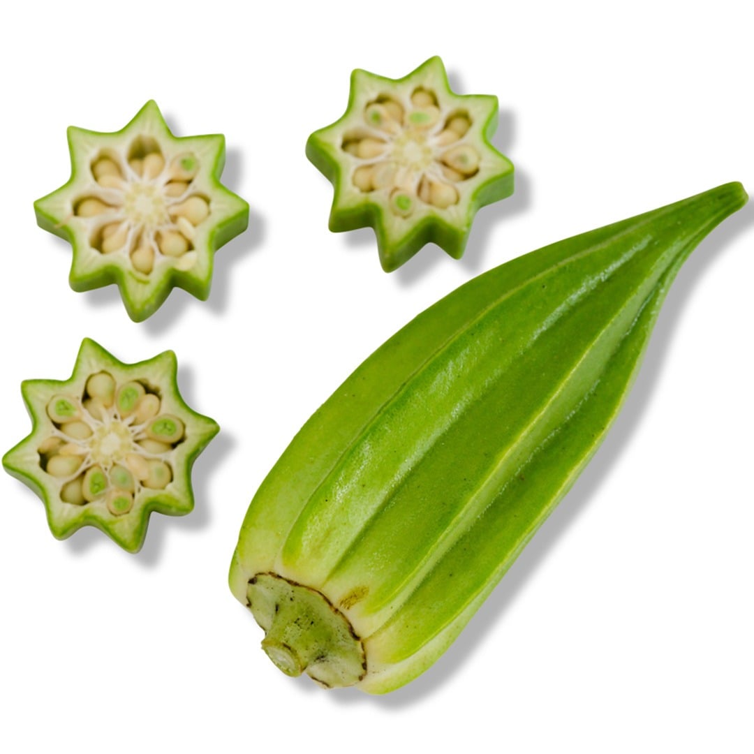 Cut and whole Eagle Pass Okra on a white background.