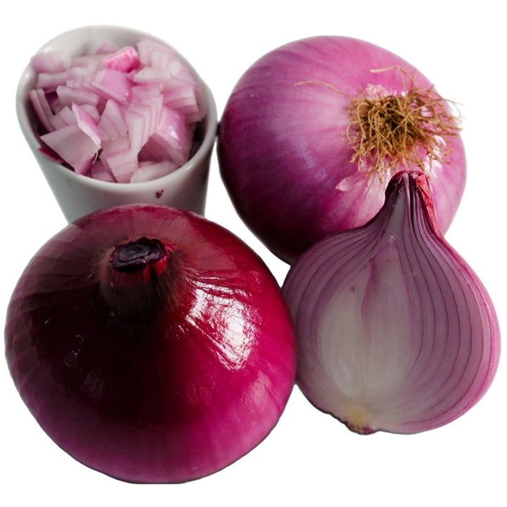 Cut and whole Round Tropea Onions on a white background.