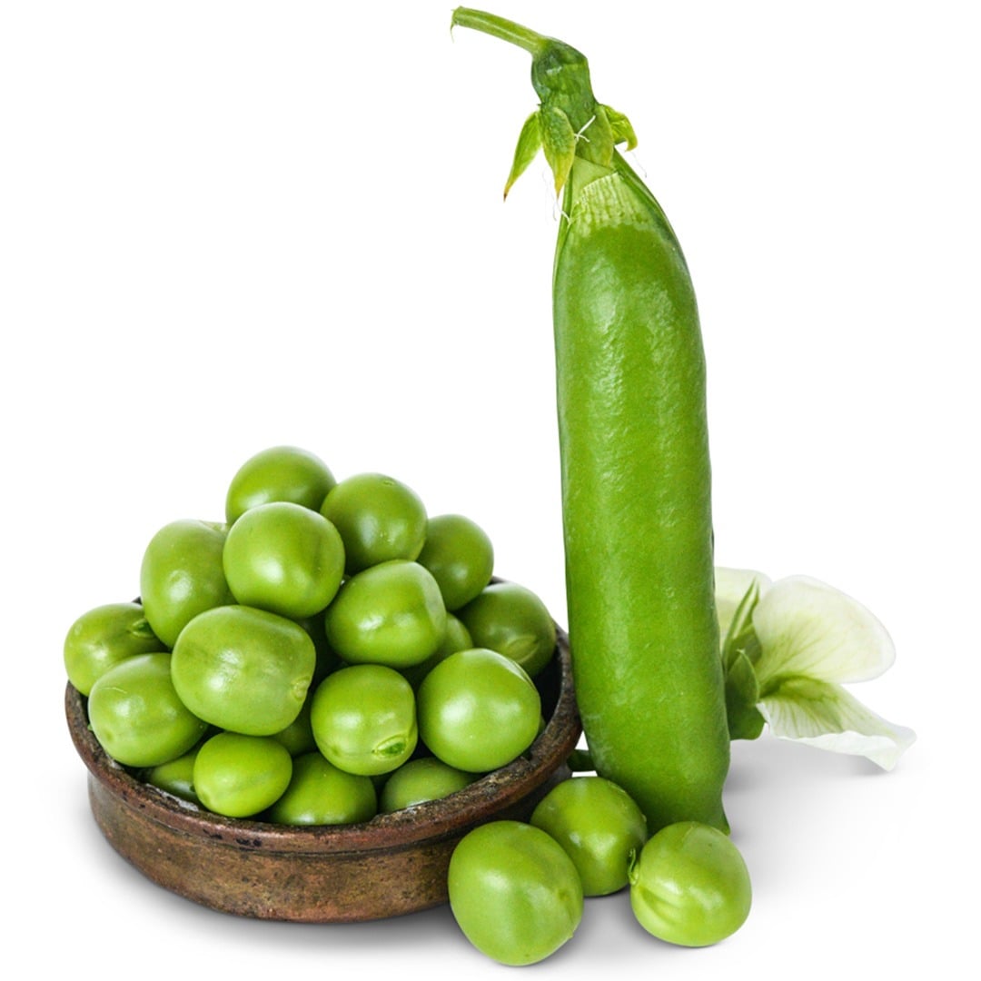 Lillian's Caseload Garden Peas in a small dish with pea pod on a white background.