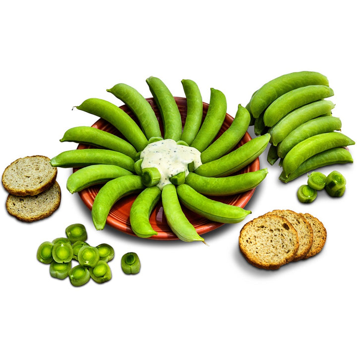 Sugar Bon Snap Pea pods on a red plate with dip on a white background.