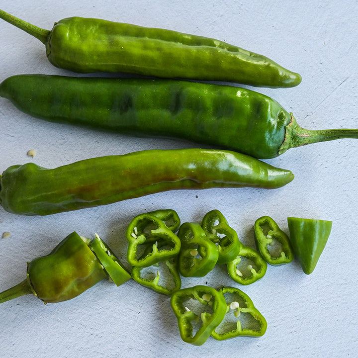 Anaheim Peppers, whole and sliced.