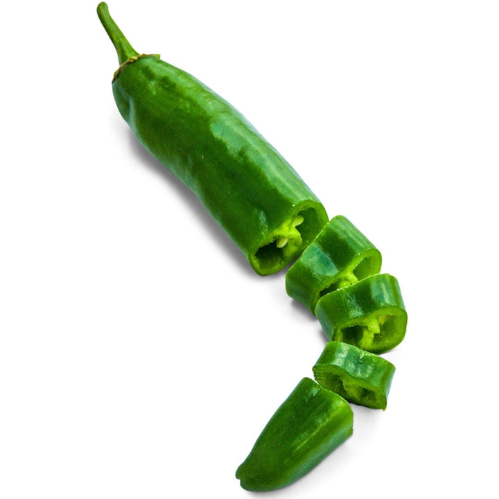 Single Anaheim Hot Pepper cut into slices on a white background.
