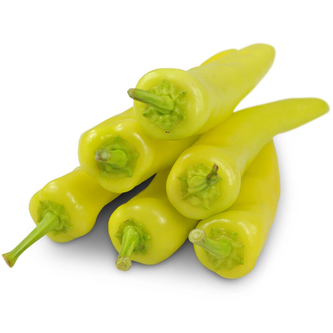Hungarian Hot Wax Peppers stack on white background.