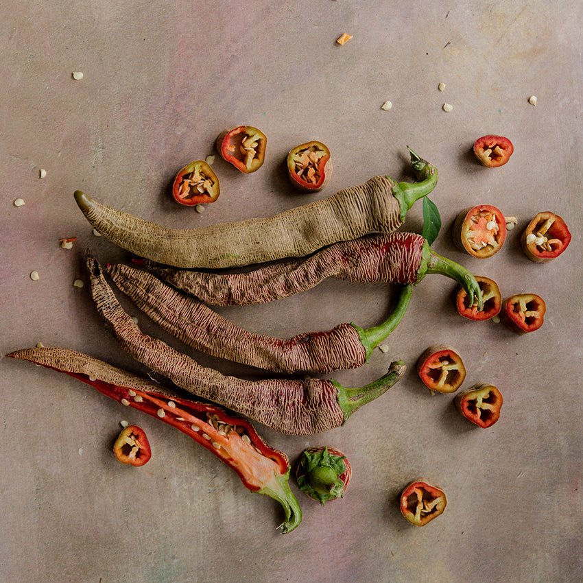 Rezha Macedonian Peppers with slices on light background.
