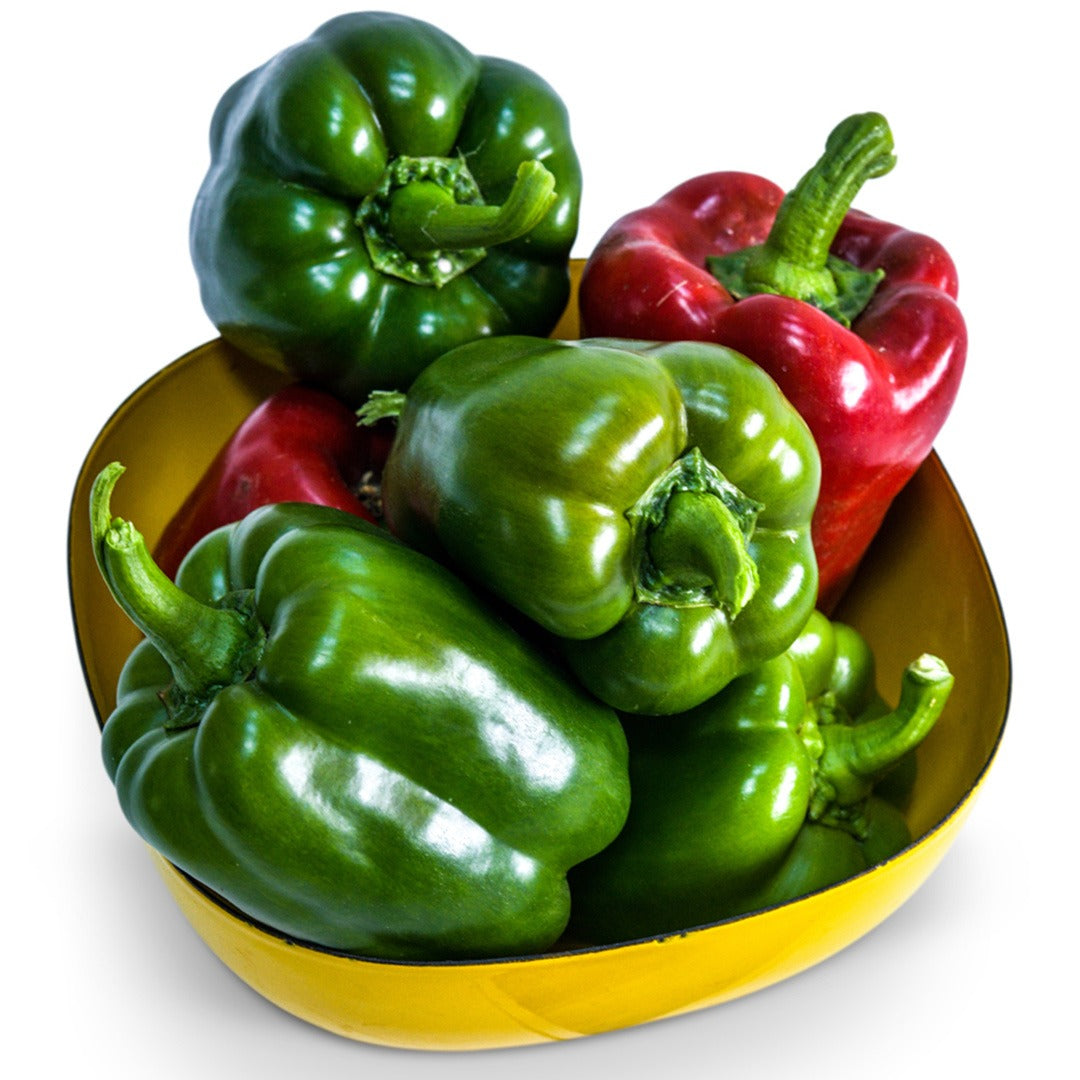 California Wonder Sweet Peppers in a yellow bowl on a white background.