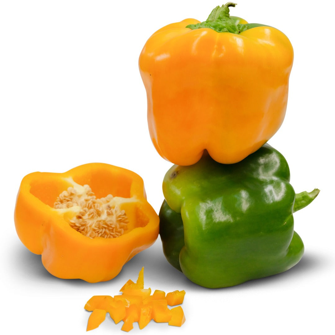 Pair of Canary Bell Sweet Peppers stacked with another cut in half on a white background.