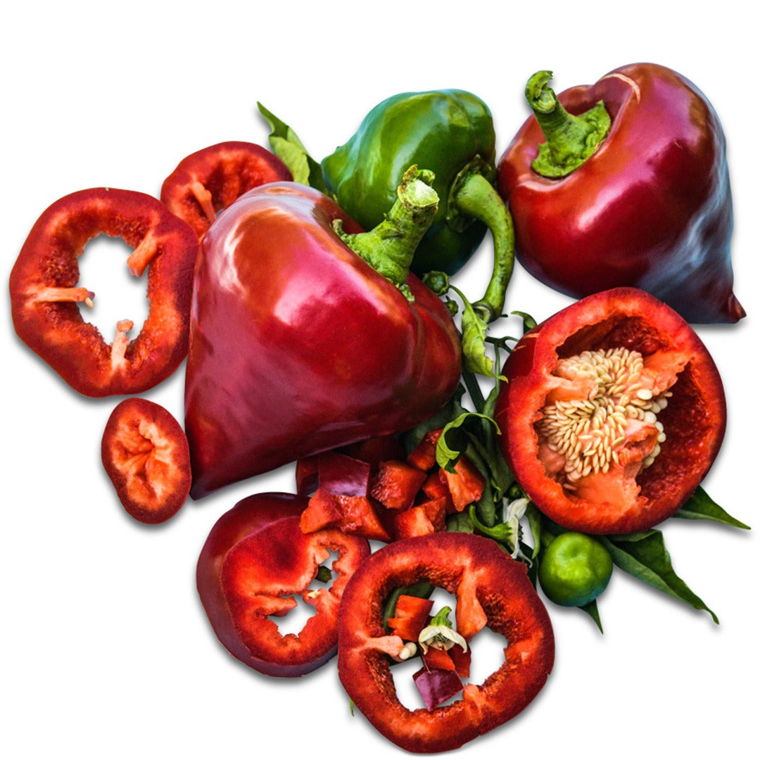 Whole and cut Lesya Sweet Peppers on a white background.
