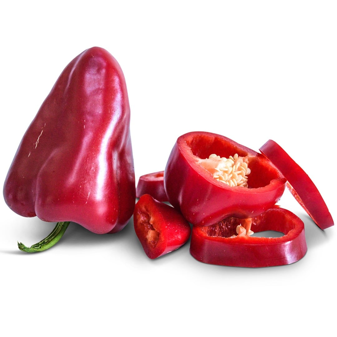 One whole Lipstick Sweet pepper with pepper slices on a white background.