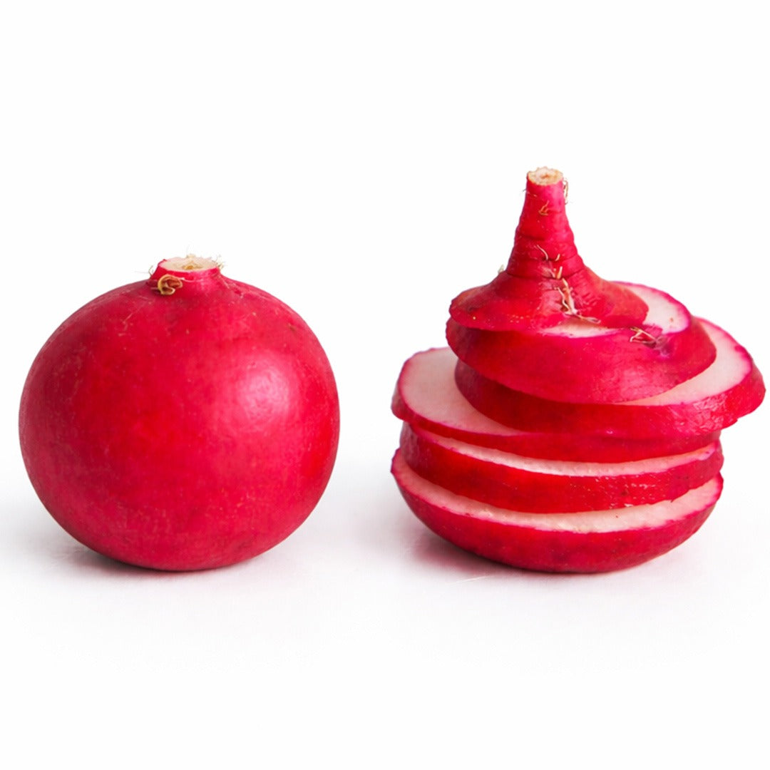 Early Scarlet Globe radish next to radish slices on a white background.