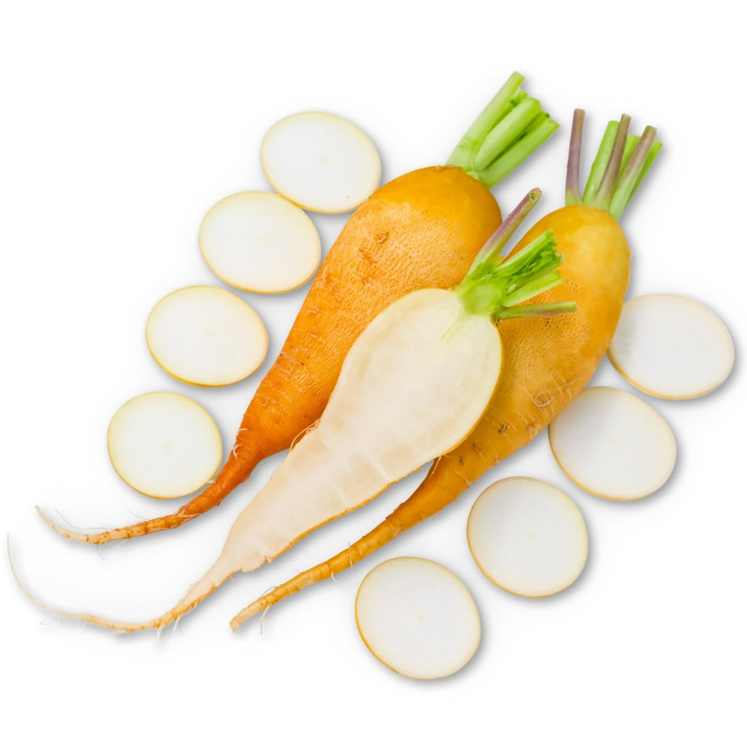 Sliced and whole Lutea Carrot Radishes on a white background.