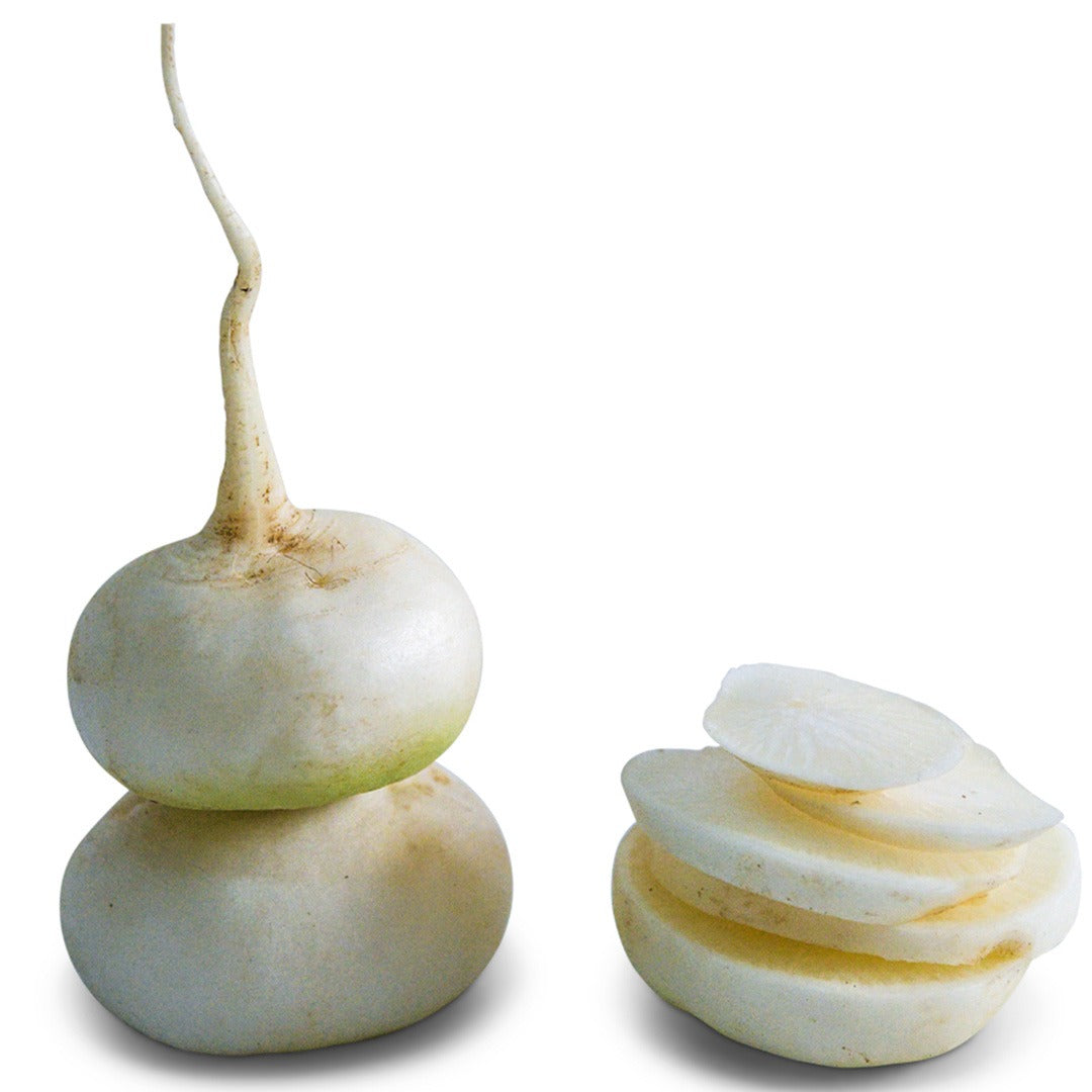 Two White Hailstone Radishes stacked with slices on a white background.