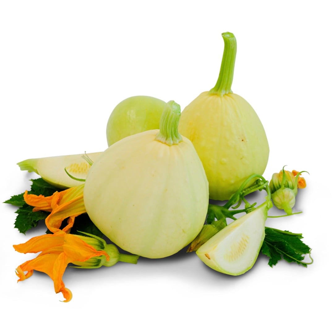 Whole and cut Desi Summer Squash with foliage on a white background.
