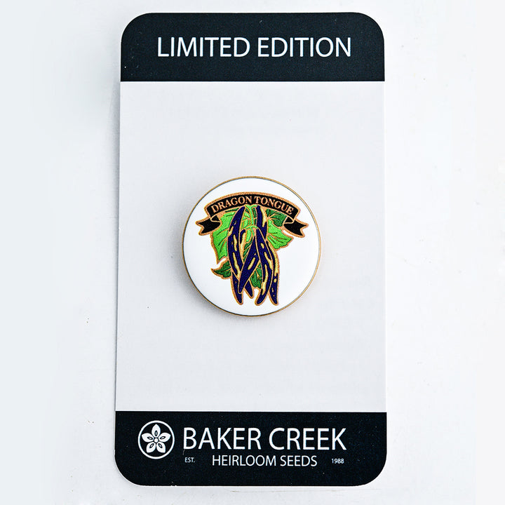 A Limited Edition Dragon Tongue Bean Pin shown with packaging on a white background.