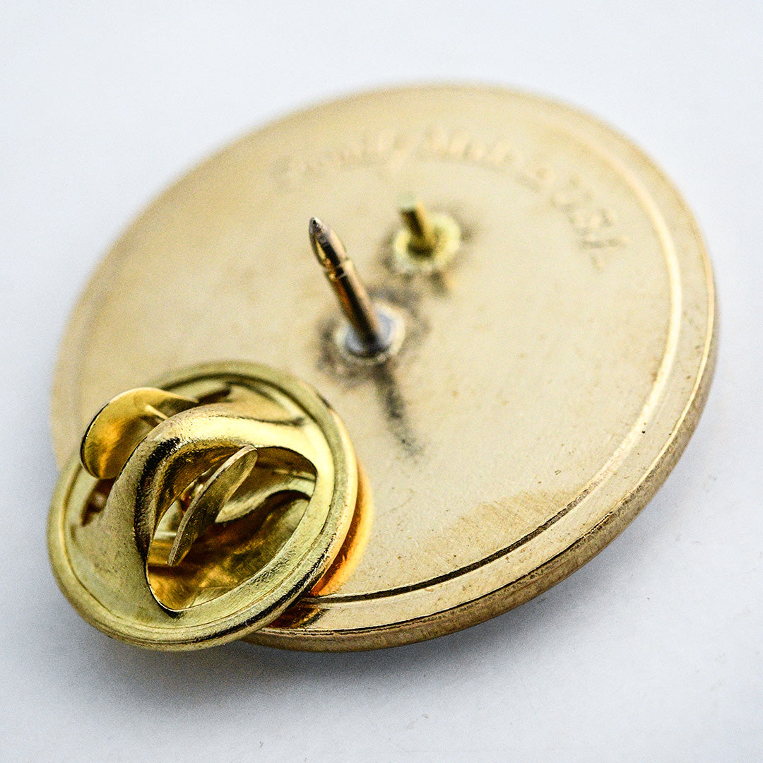 A close-up view of the back of the Limited Edition Dragon Tongue Bean Pin.