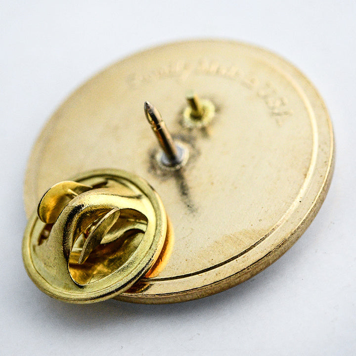 A close-up view of the back of the Limited Edition Dragon Tongue Bean Pin.