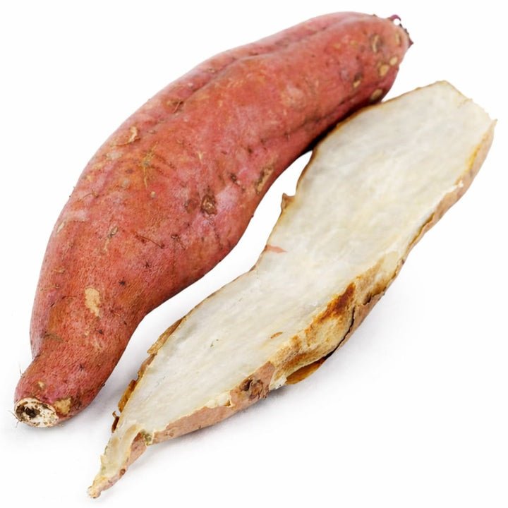 Whole cooked and raw Seon Mi Sweet Potato Plants on a white background.