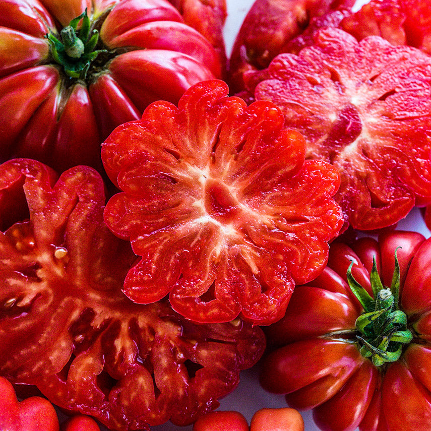 Close-up view of juicy sliced Mushroom Basket Tomatoes.