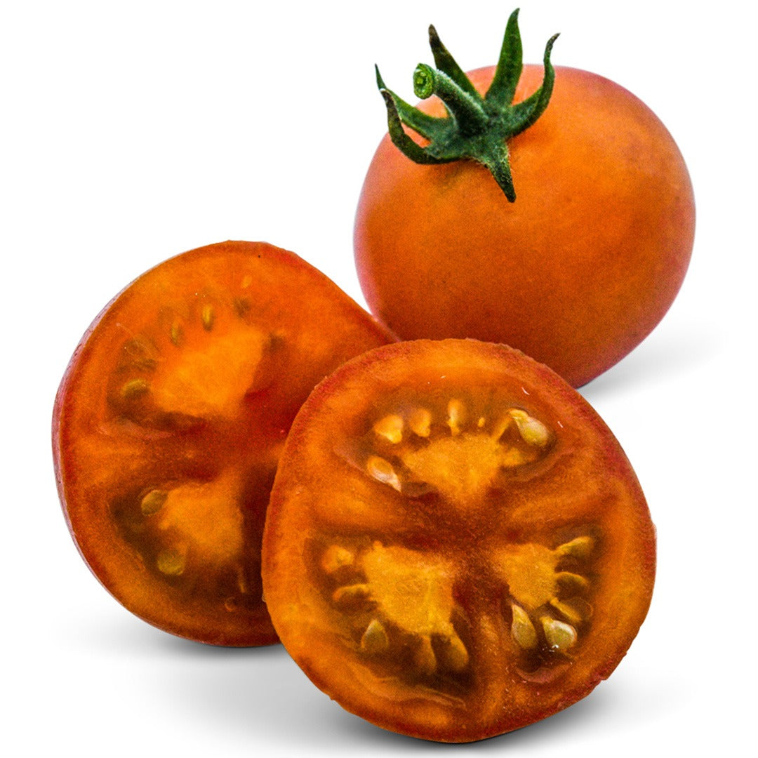 Single and sliced Isis Candy Cherry Tomatoes on a white background.