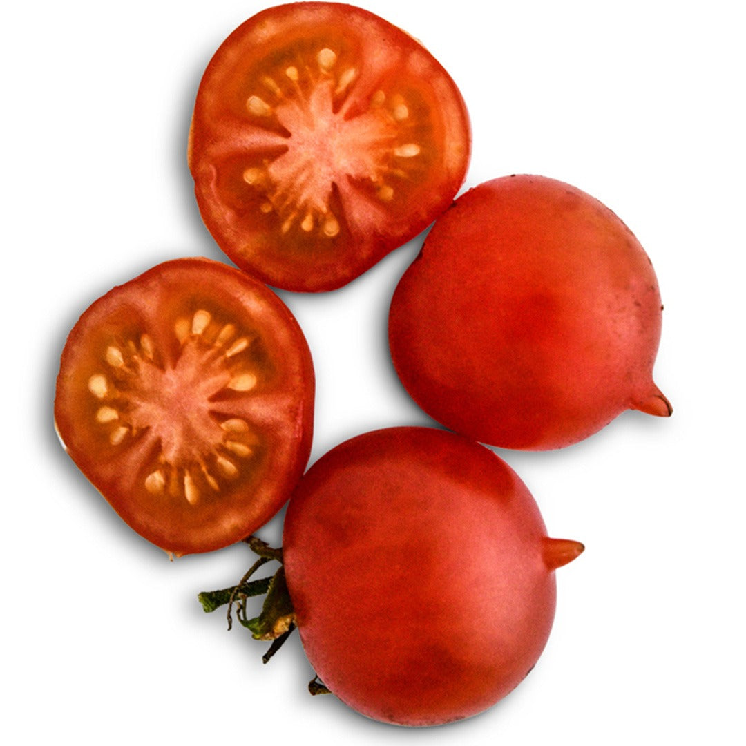 Pair of Riesentraube Tomatoes sliced in half on a white background.