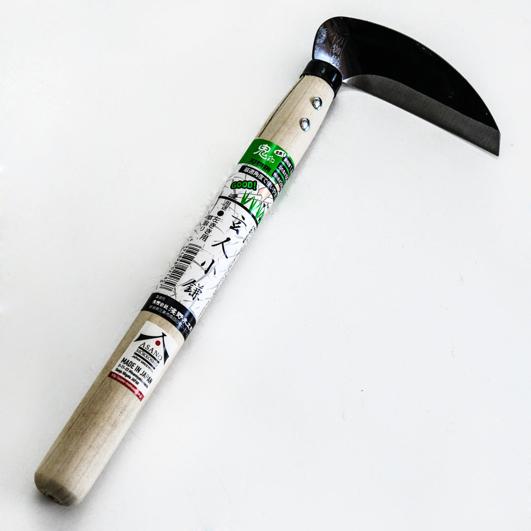 Left Handed Professional Sickle without the packaging on a light white background.