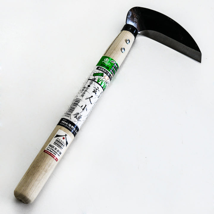 Left Handed Professional Sickle without the packaging on a light white background.