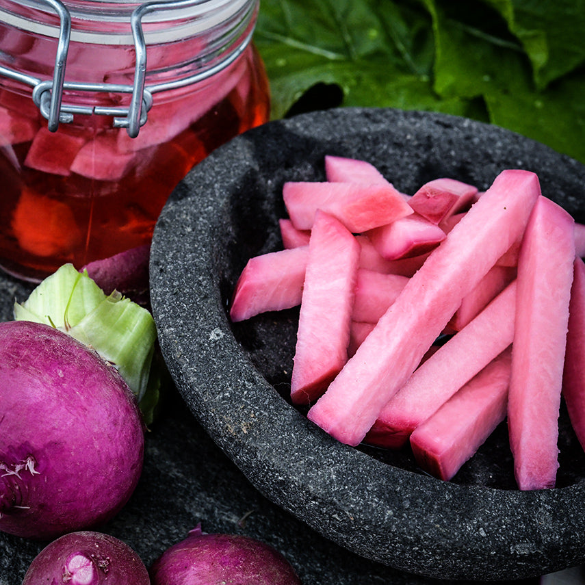 Hida Beni Red Turnips pickled with fresh turnips on the side.